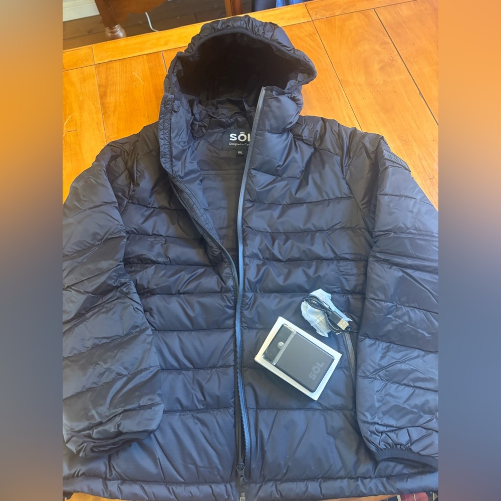 Black puffy coat with heat option